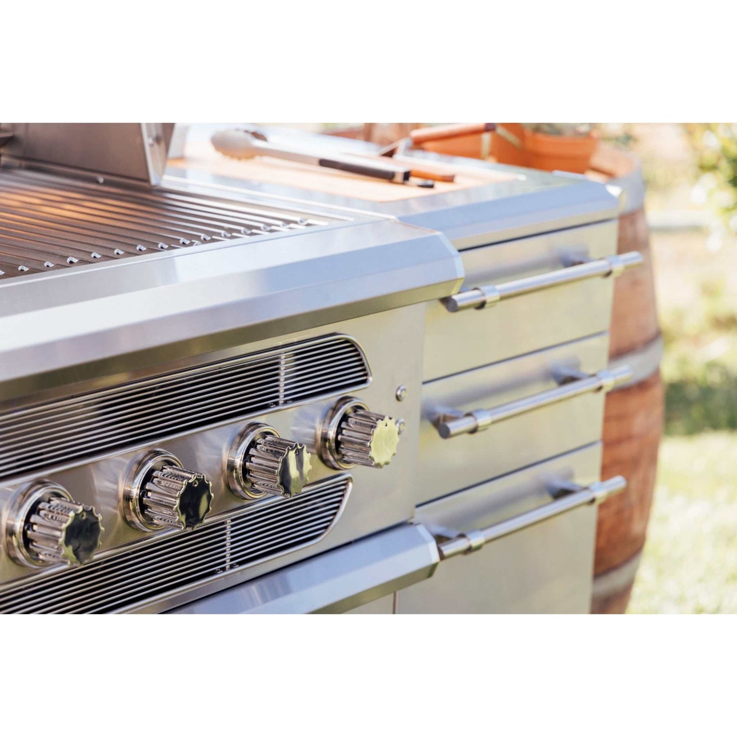 American Made Grills 54-Inch freestanding hybrid grill with liquid propane and stainless steel construction