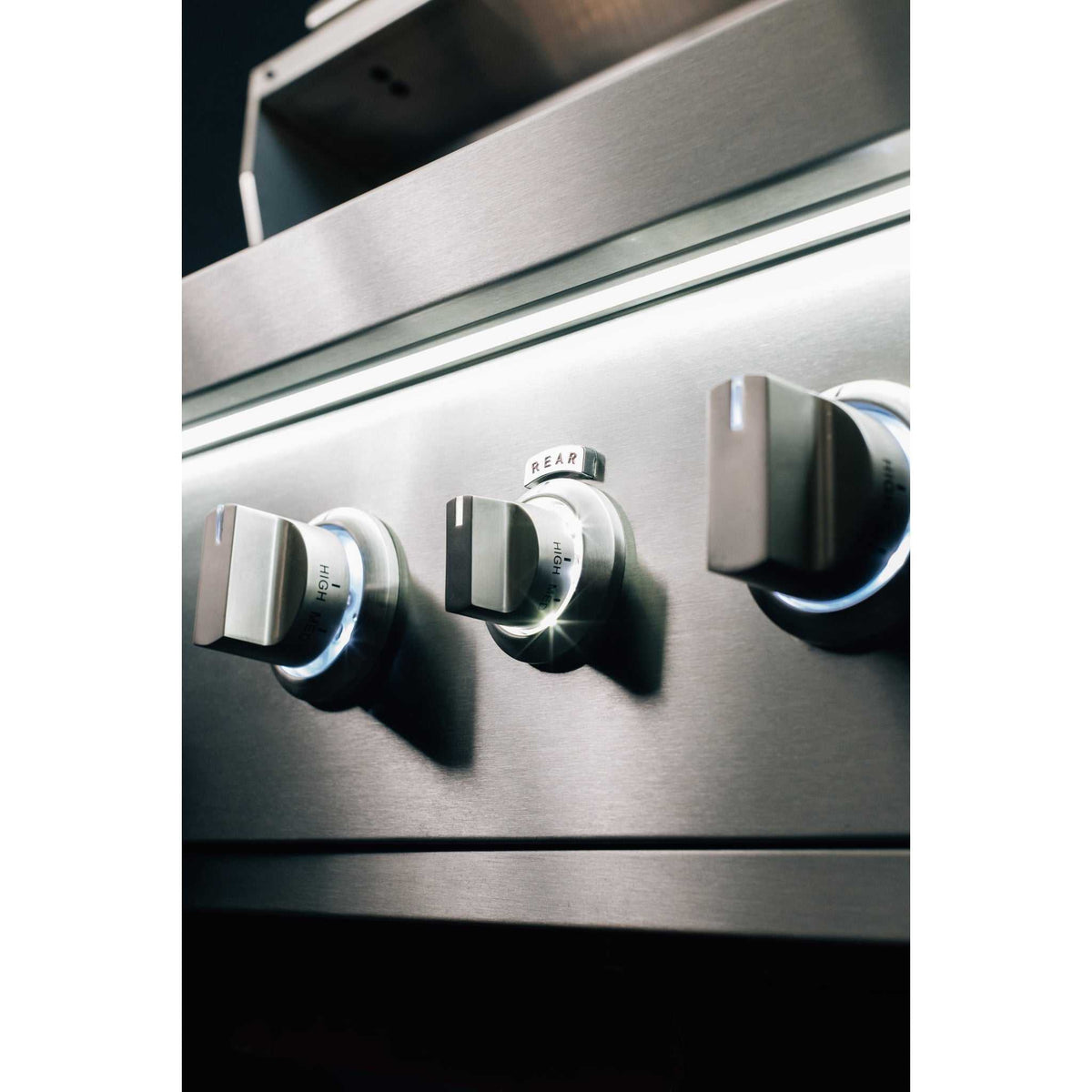 Summerset Quest 30" Grill with brushed stainless steel finish and three black control knobs, including rear burner dial